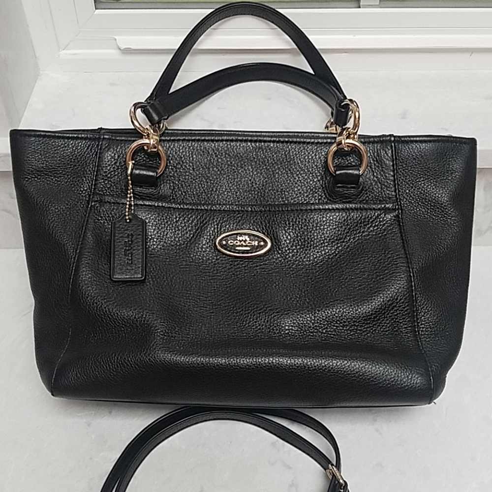 Coach satchel with crossbody strap.